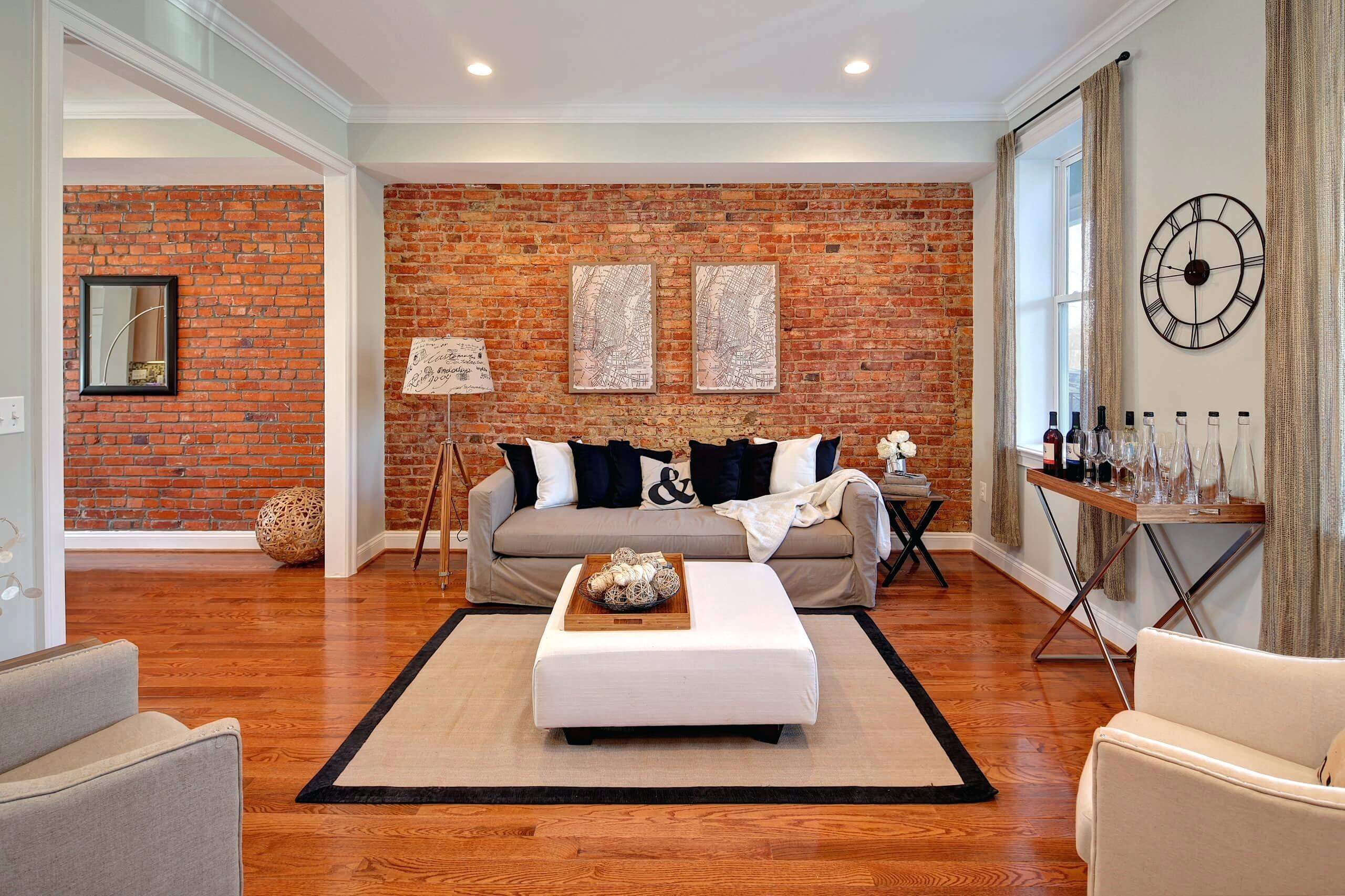 living room with brick wallpaper